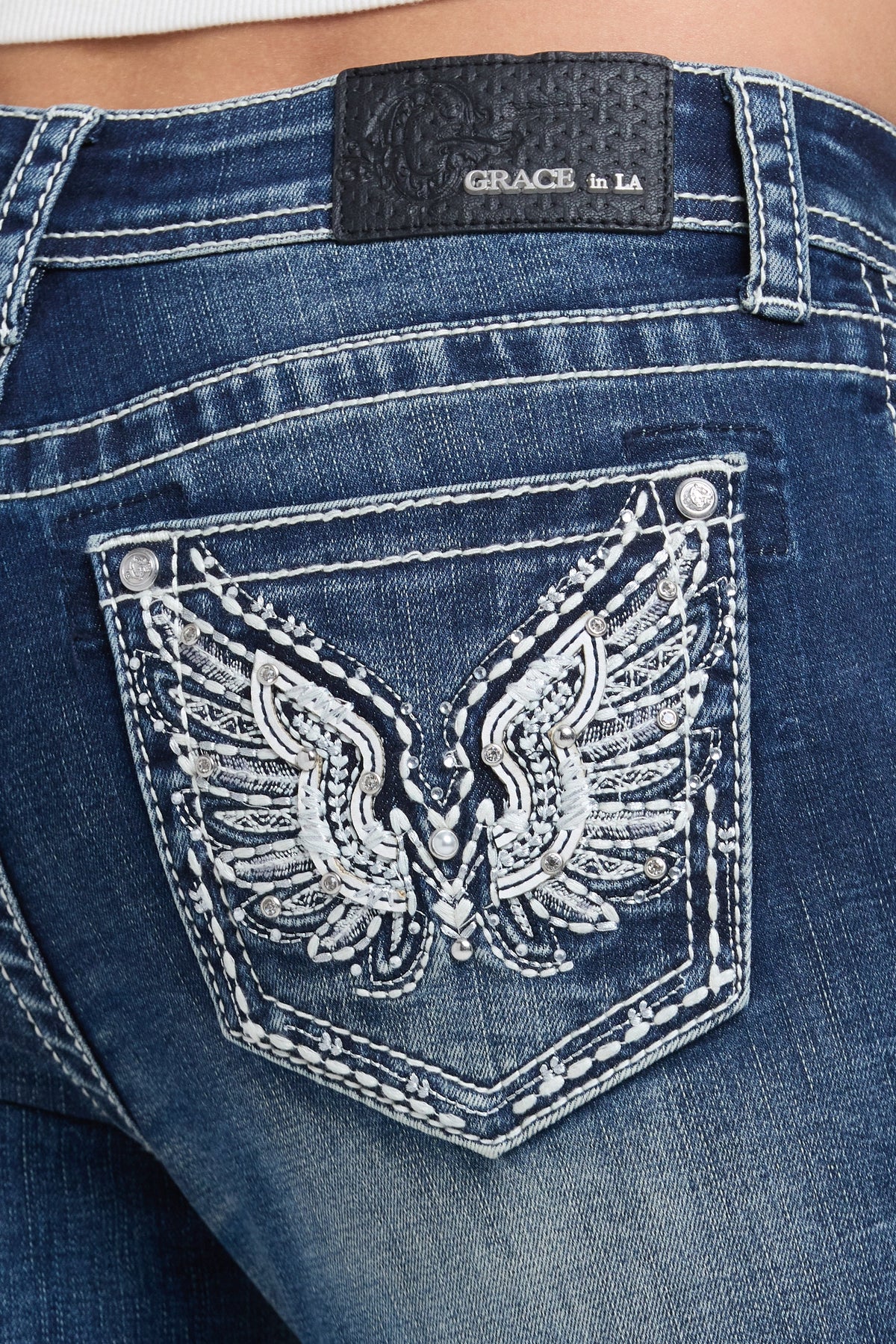 Product view 2 of blue bootcut jeans with wing embroidery