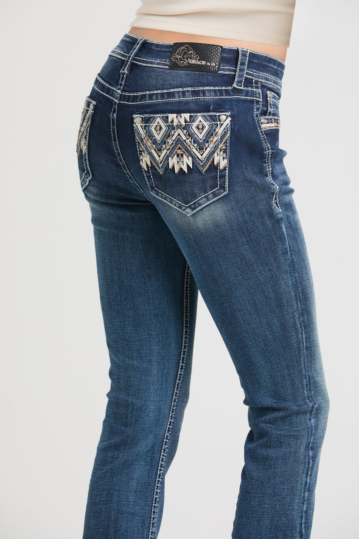 Product view 3 of blue bootcut jeans with aztec embroidery