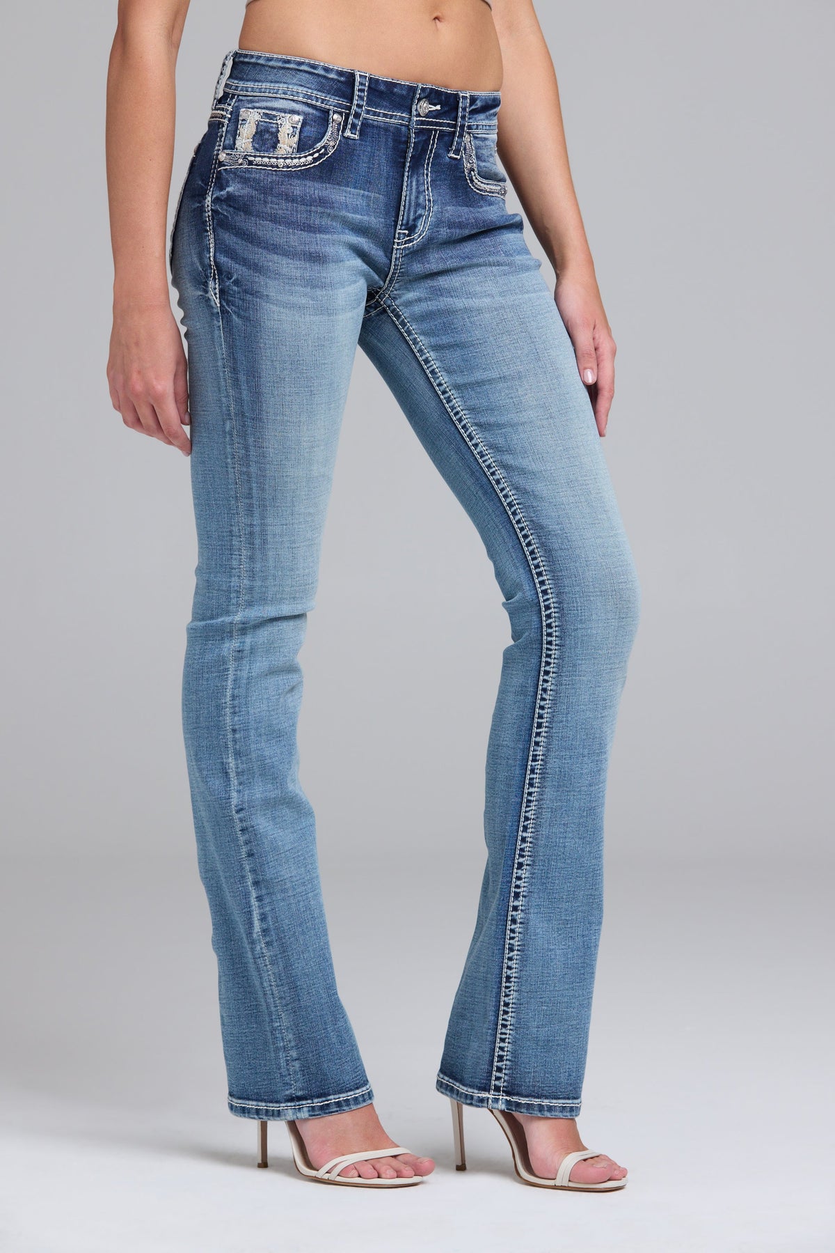 Product view 4 of blue bootcut jeans with horse shoe stitching