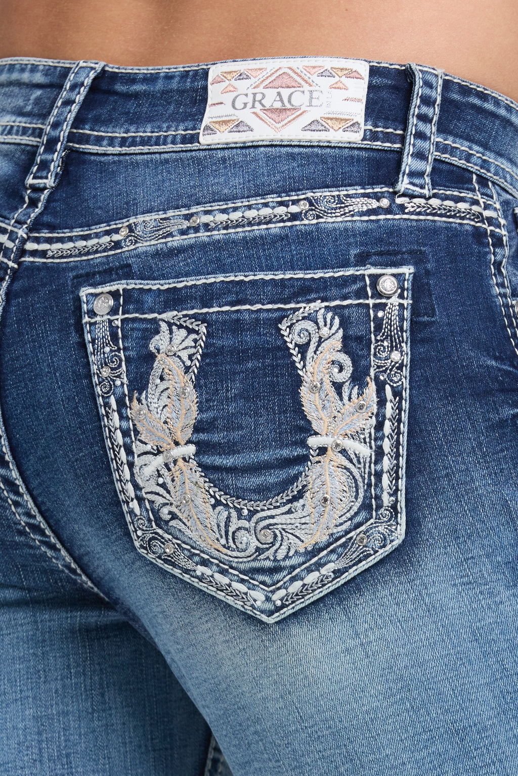 Product view 2 of blue bootcut jeans with horse shoe stitching