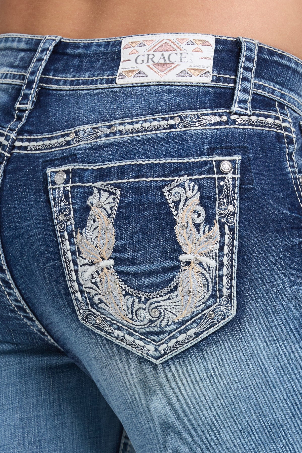 Product view 2 of blue bootcut jeans with horse shoe stitching