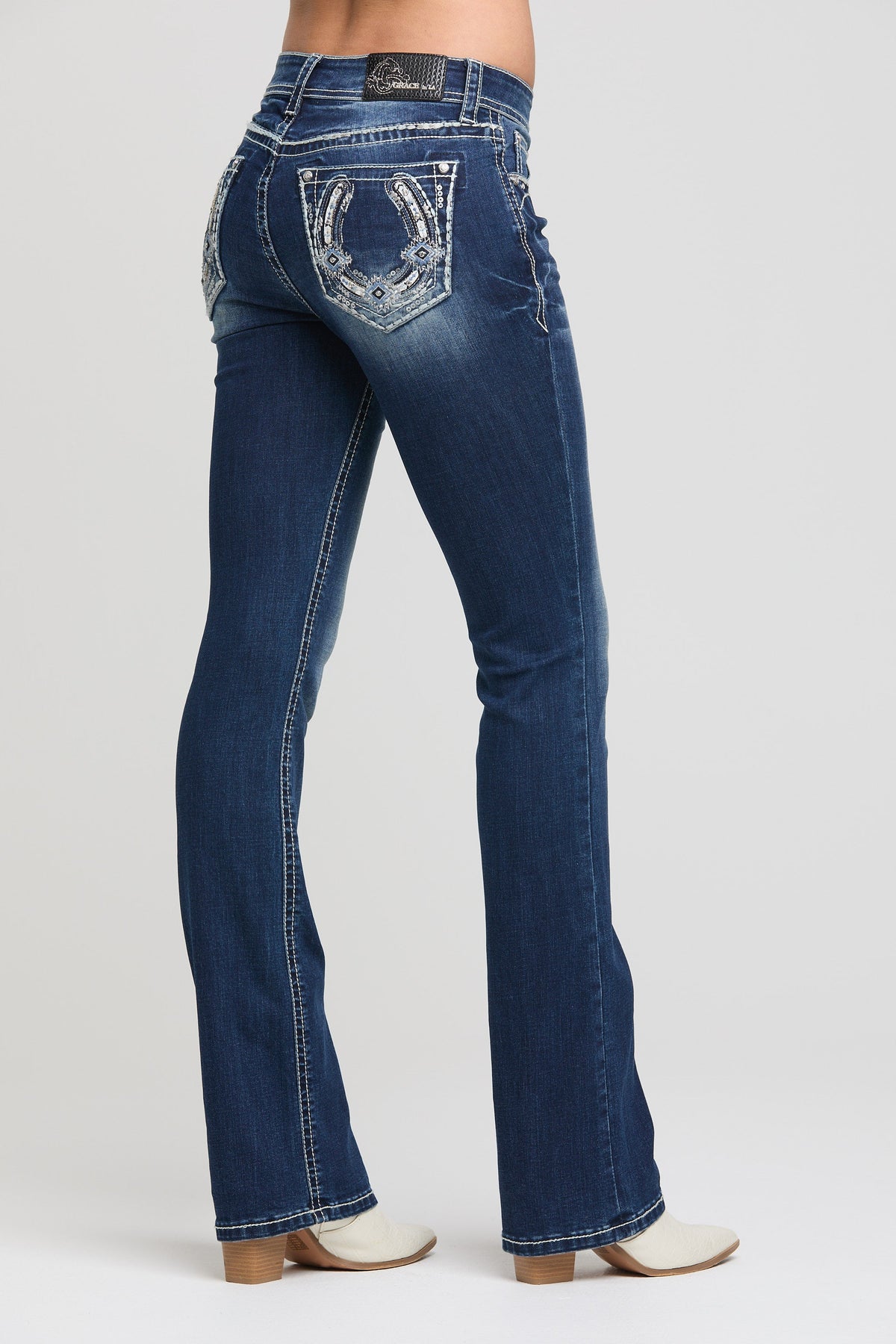 Product view 1 of blue bootcut jeans with horseshoe detail