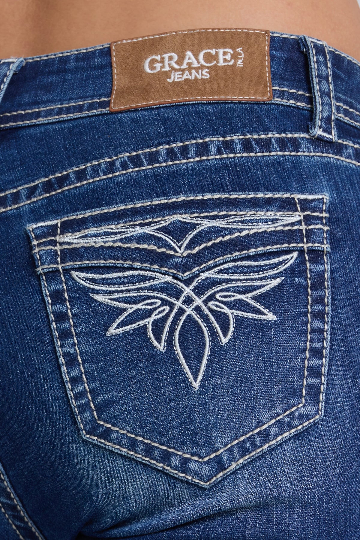 Product view 2 of blue bootcut jeans with toe bug detail