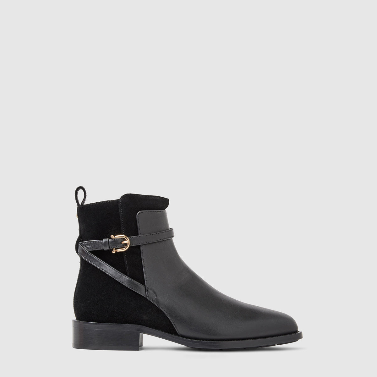 Nettie ankle boot in black leather with a criss-cross buckle